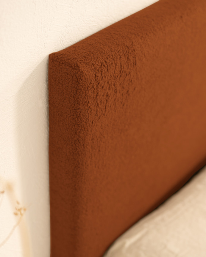 Upholstered cotton headboard in terracotta color available in various sizes.