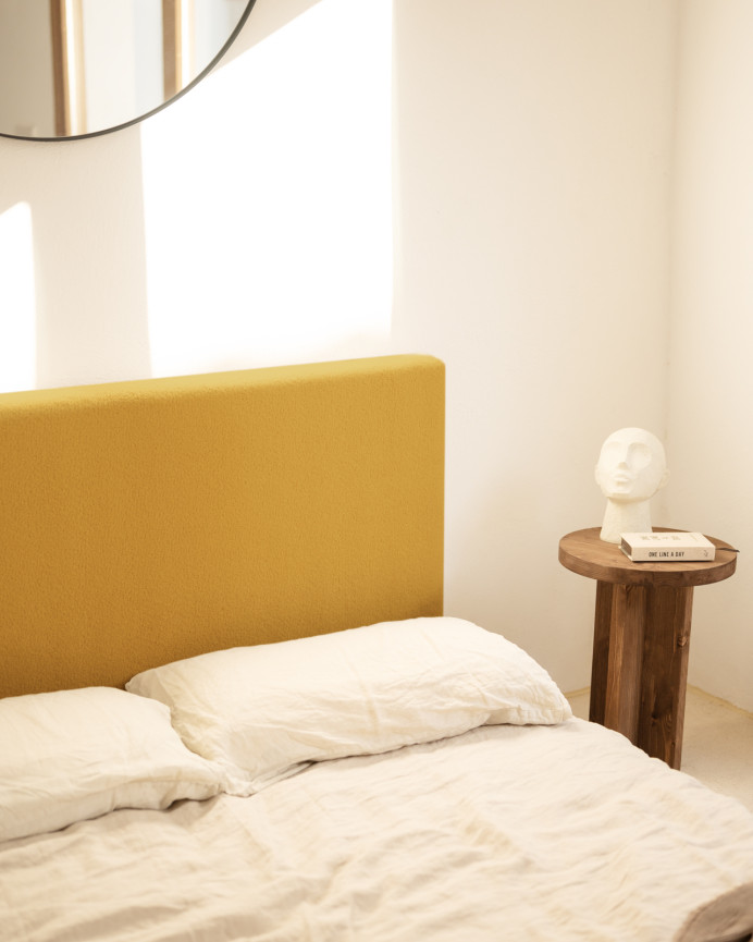 Upholstered cotton headboard in mustard color available in various sizes.