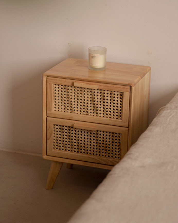 Set of upholstered beige headboard and 2 solid wood natural tone bedside tables in various sizes.