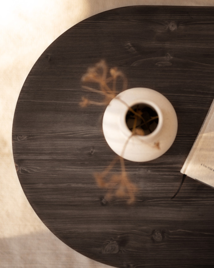 Solid wood black coffee table measuring 120x50cm