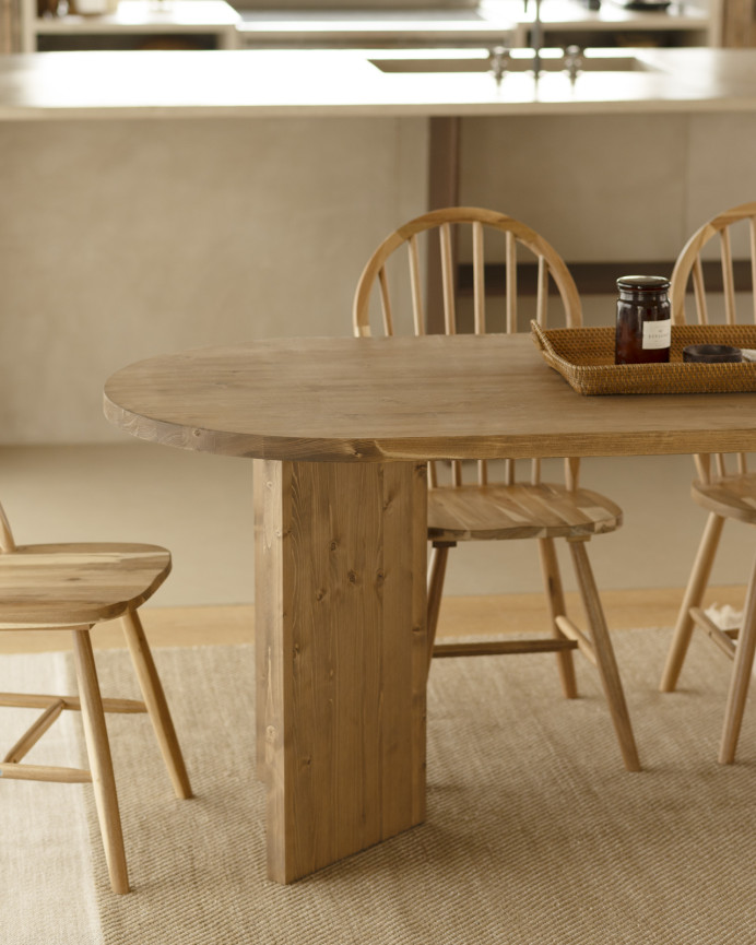 Solid wood dining table in a dark oak tone available in various sizes.