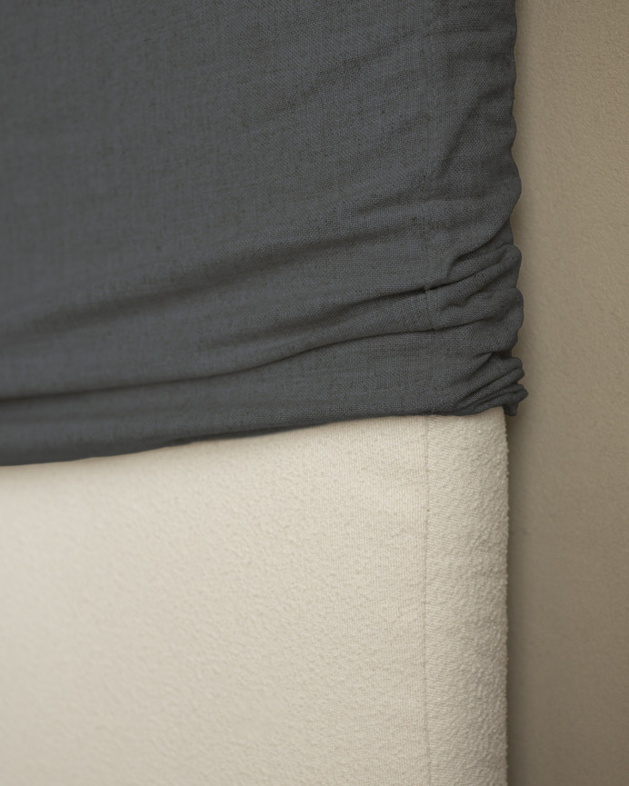 Upholstered blue linen headboard with removable cover, available in various sizes.
