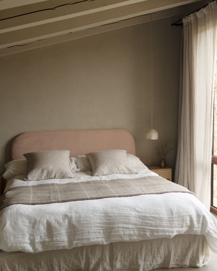 Upholstered headboard with removable coral corduroy cover, available in various sizes.