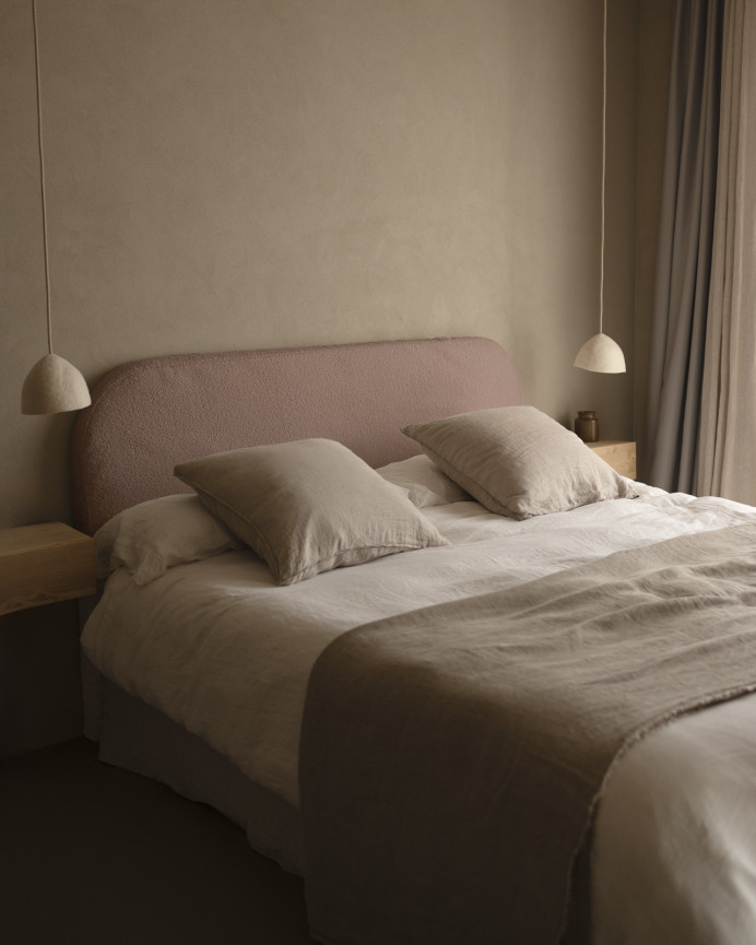 Pink bouclé headboard cover available in various sizes.