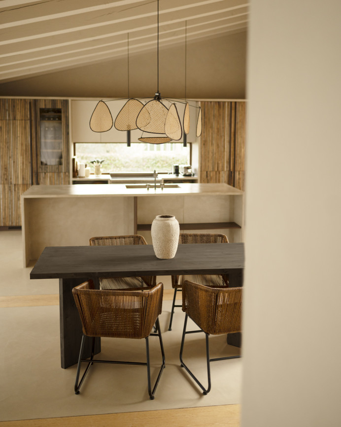 Solid wood dining table in black tone available in various sizes.