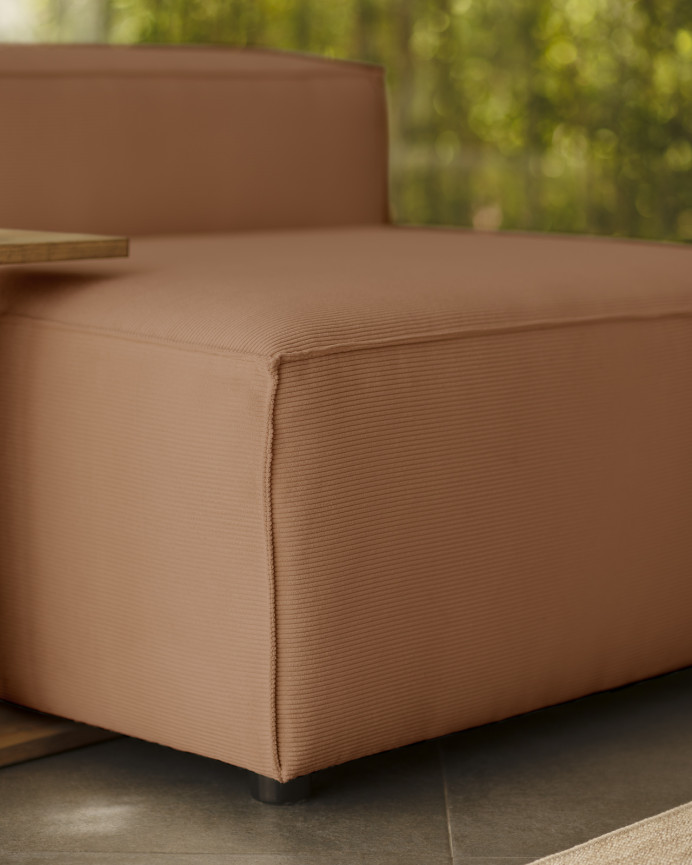 Coral colored corduroy armchair measuring 110x90cm.