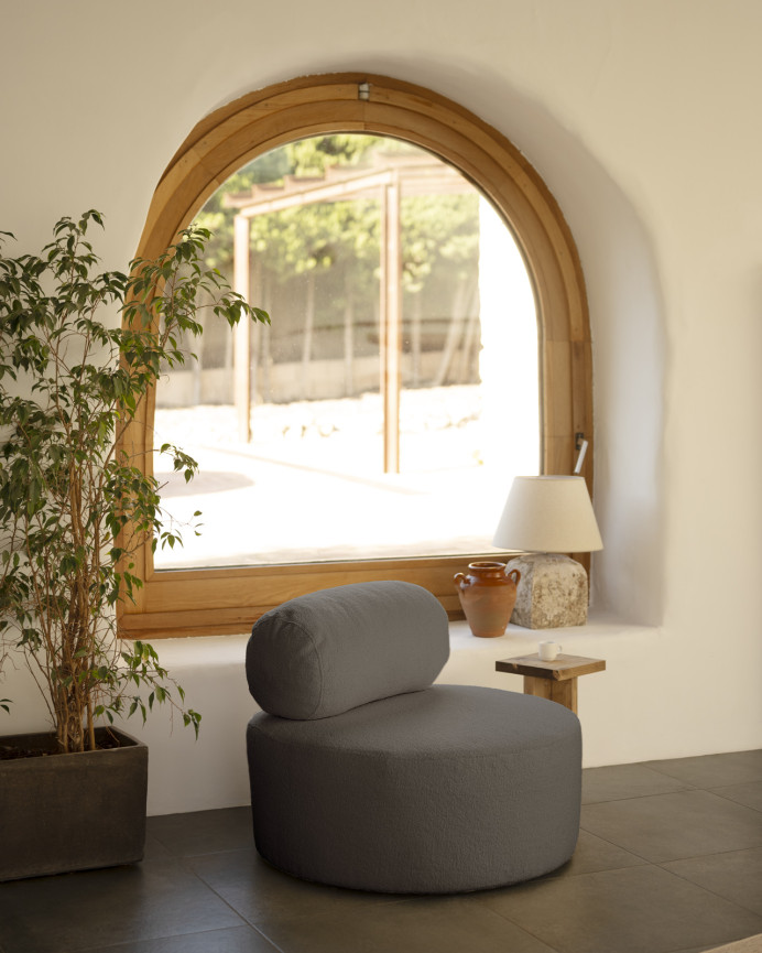 Round dark gray bouclé armchair measuring 91x71cm