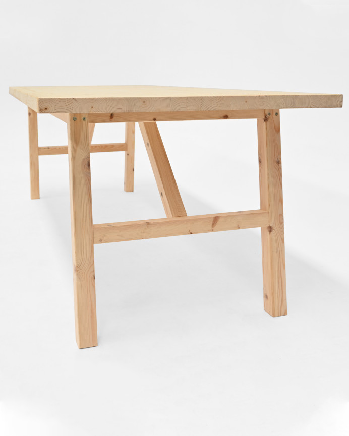 Solid wood dining table in a natural tone available in various sizes