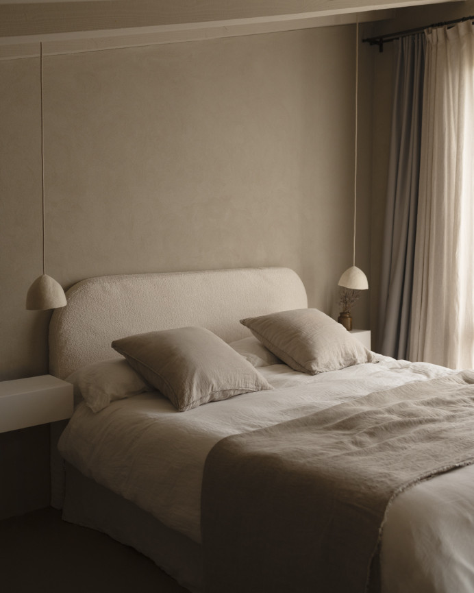 White bouclé headboard cover in various sizes.