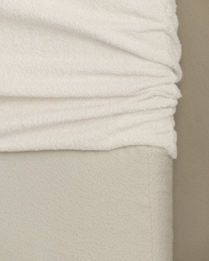 Upholstered white bouclé headboard with removable cover in various sizes
