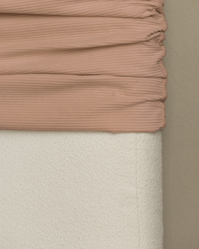Upholstered headboard with removable coral corduroy cover, available in various sizes.