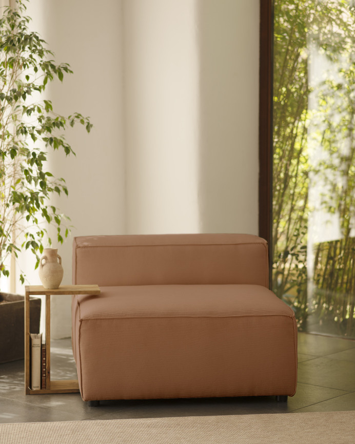 Coral colored corduroy armchair measuring 110x90cm.