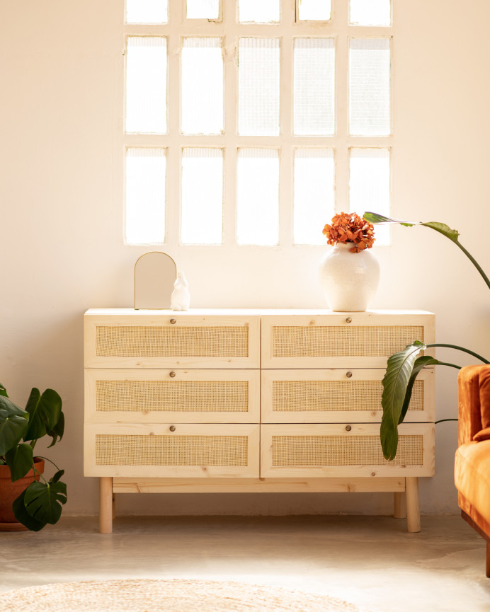 Solid wood and raffia dresser with six drawers in a natural tone measuring 76x120cm.