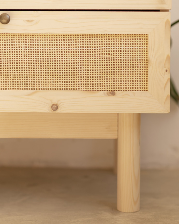 Solid wood and raffia dresser with six drawers in a natural tone measuring 76x120cm.