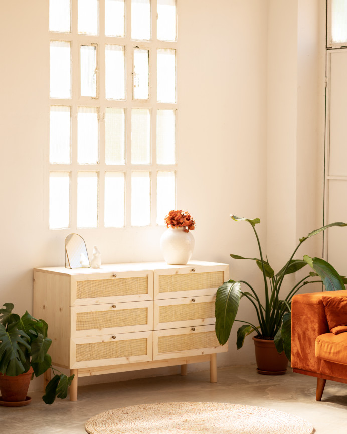 Solid wood and raffia dresser with six drawers in a natural tone measuring 76x120cm.
