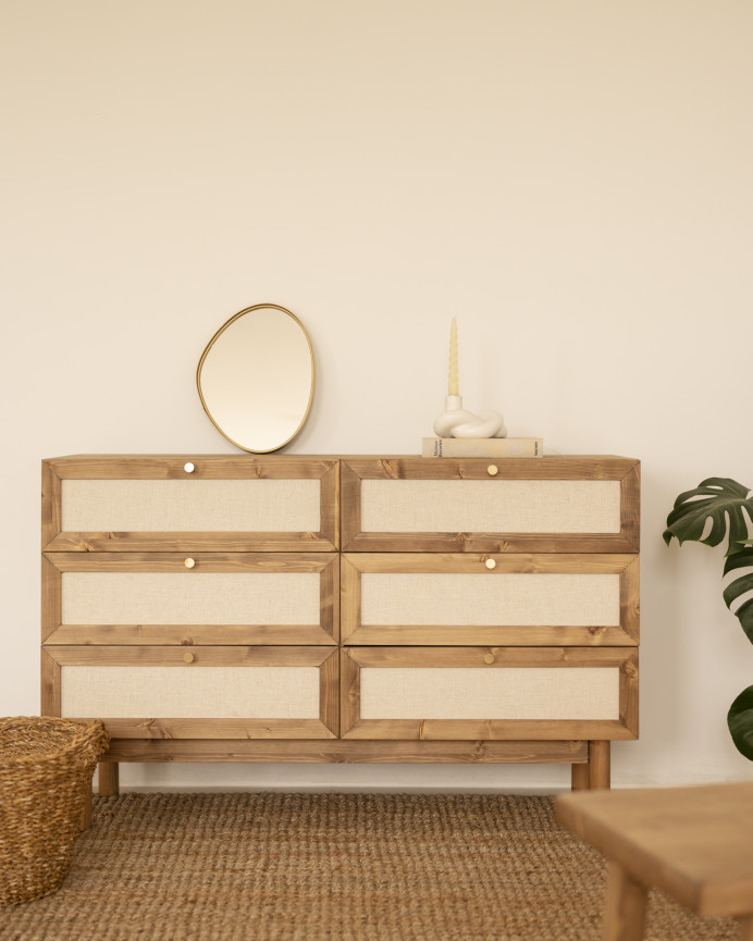 Solid wood and linen dresser with six drawers in a dark oak tone measuring 76x120cm.