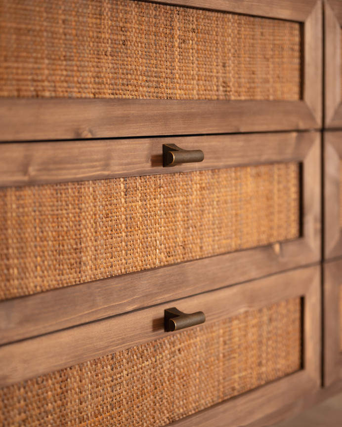 Solid wood and raffia dresser with six walnut tone drawers, measuring 76x120cm.