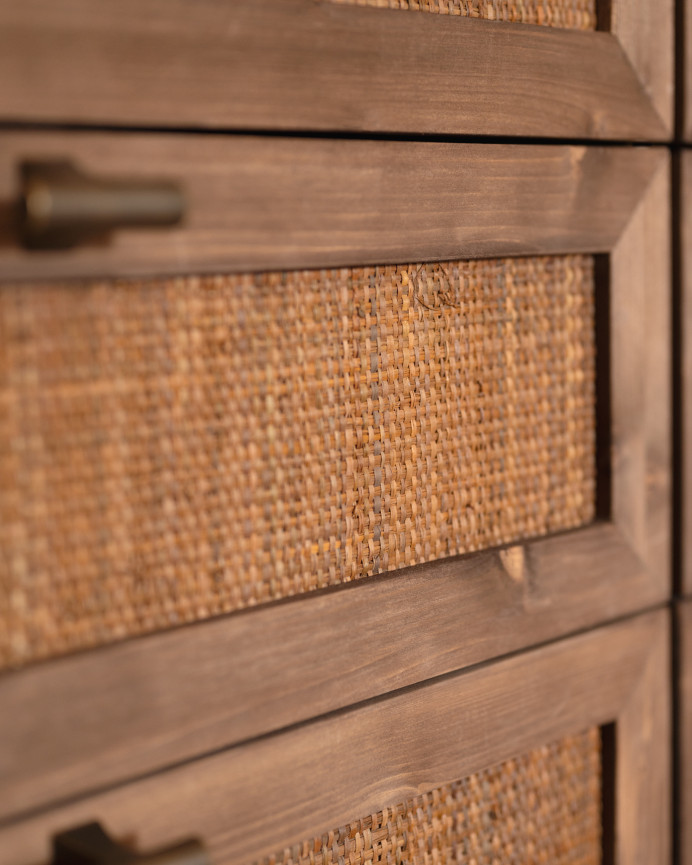 Solid wood and raffia dresser with six walnut tone drawers, measuring 76x120cm.