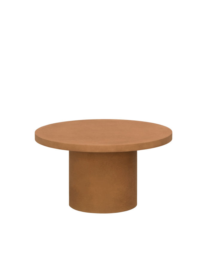 Round microcement coffee table in terracotta tone available in various sizes.