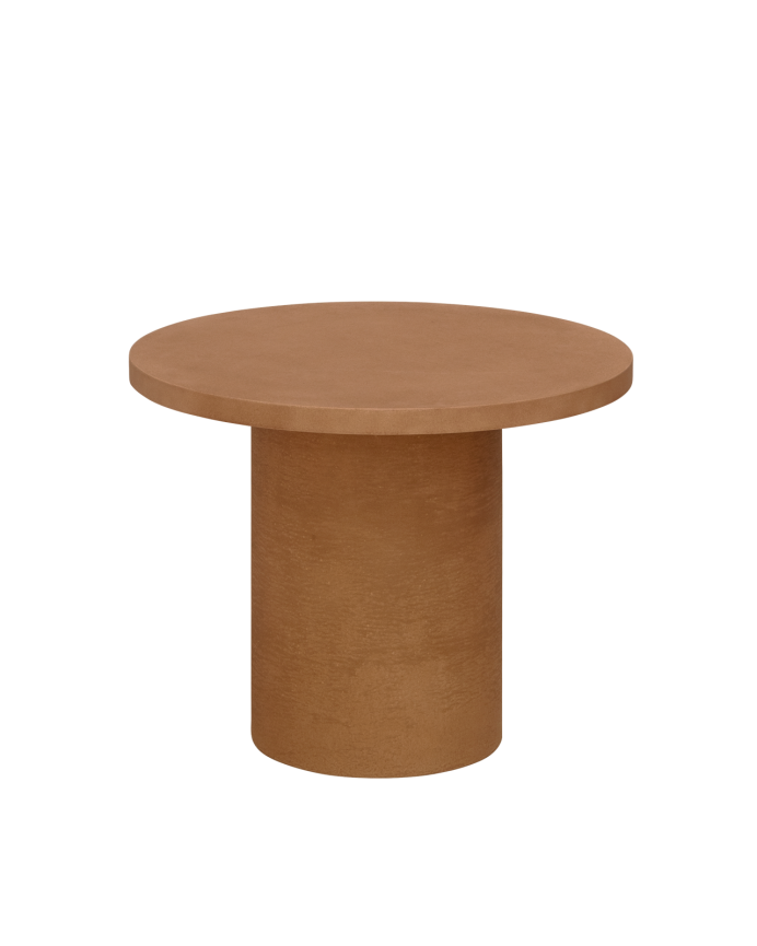 Round microcement coffee table in terracotta tone available in various sizes.
