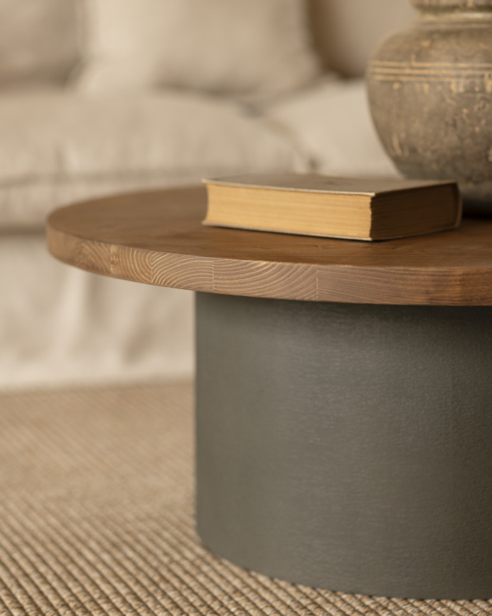 Solid wood round center table in dark oak tone with green microcement leg, measuring 80x33cm.