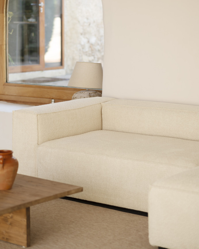 Bouclé sofa with white chaise longue in various sizes.