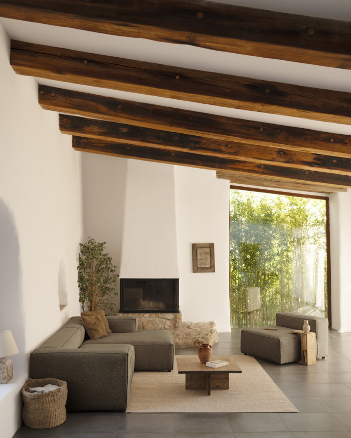 Bouclé sofa with brown chaise longue in various sizes.