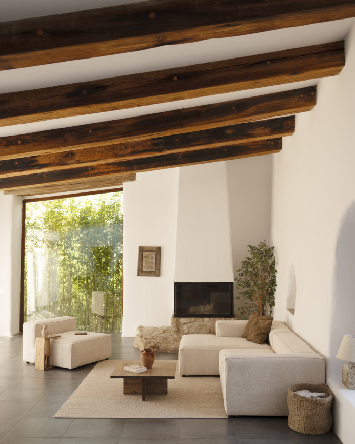 Bouclé sofa with beige chaise lounge in various sizes.