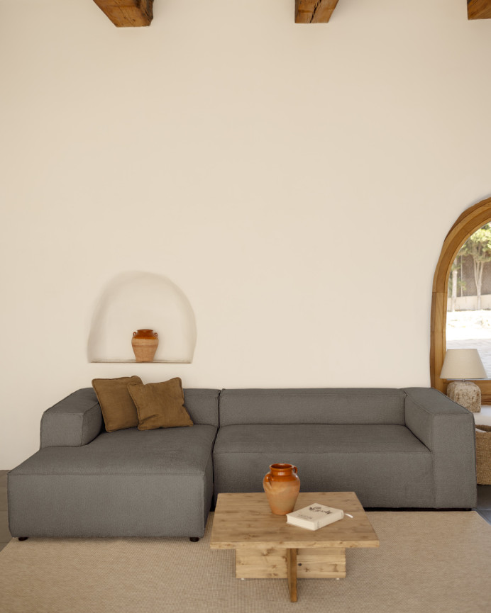 Bouclé sofa with dark gray chaise lounge in various sizes.