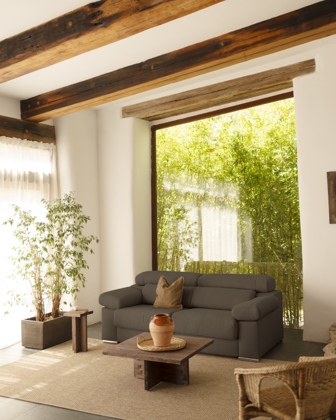 Dark gray sofa available in various sizes.