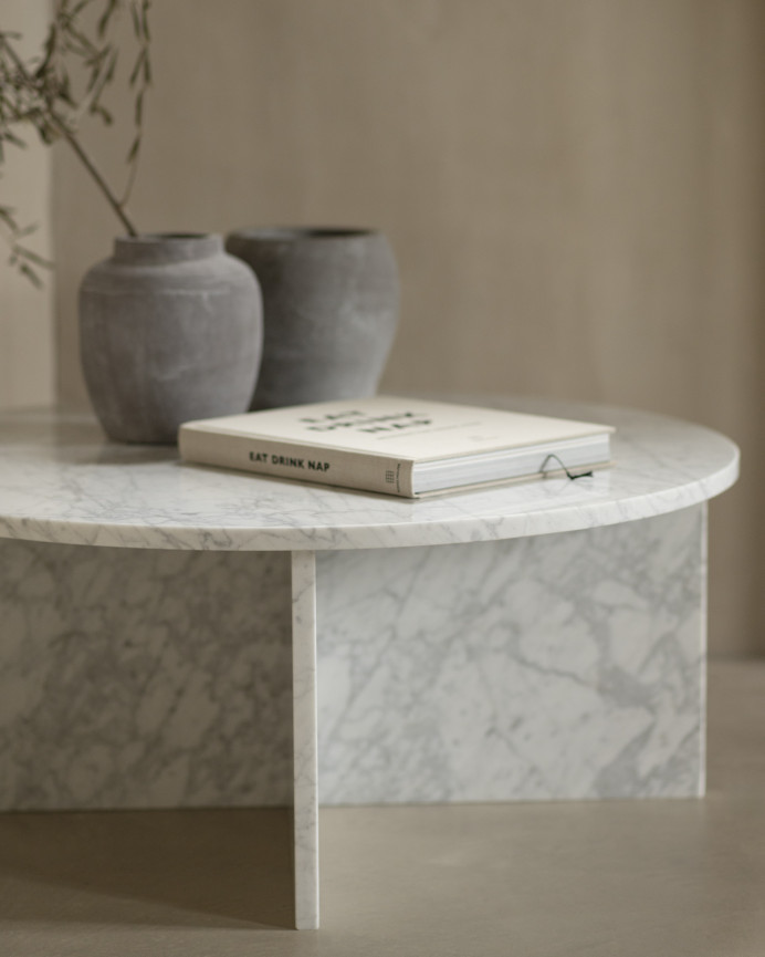 Round marble coffee table in various sizes.