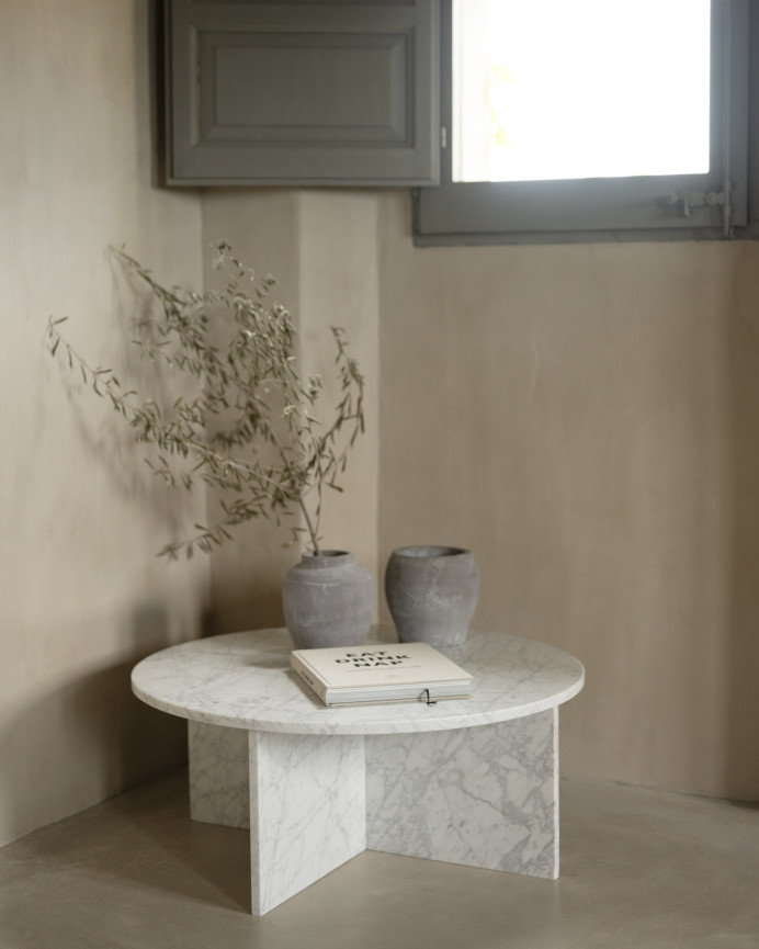 Round marble coffee table in various sizes.