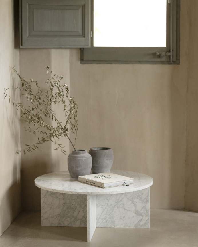 Round marble coffee table in various sizes.