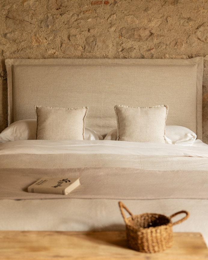 Beige linen headboard cover in various sizes.