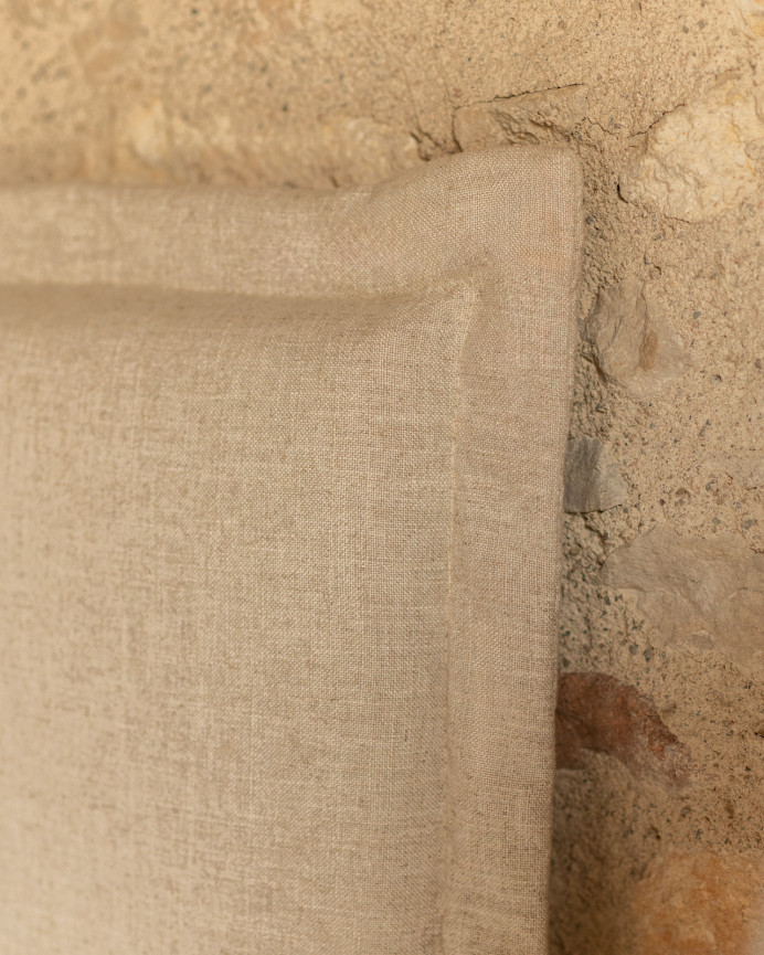 Beige linen headboard cover in various sizes.