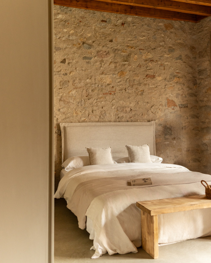 Beige linen headboard cover in various sizes.