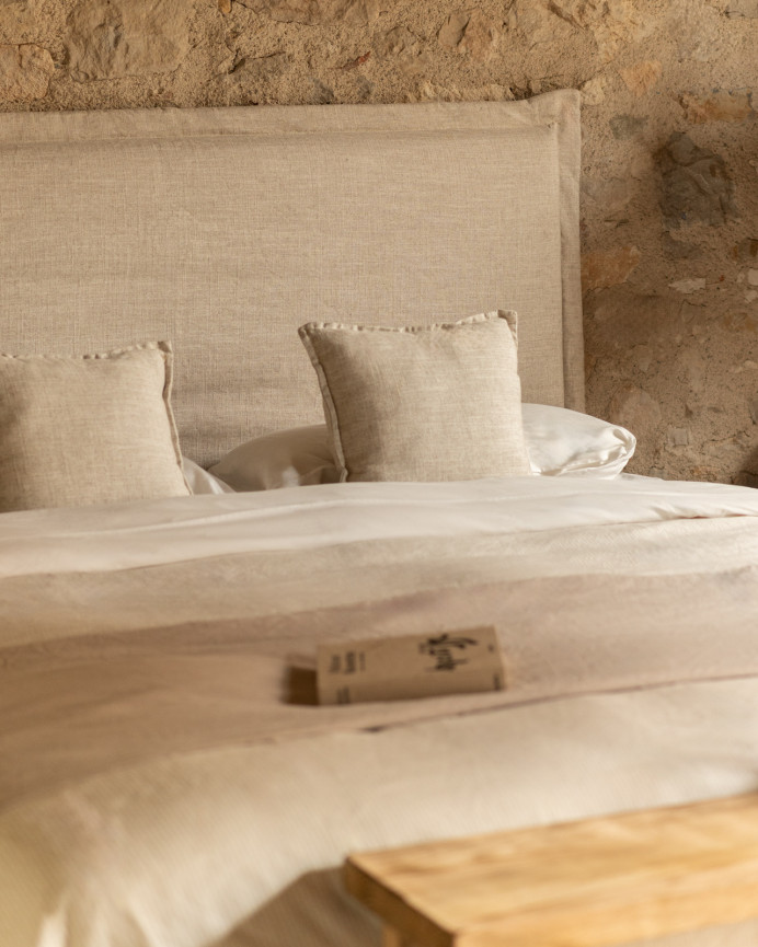 Beige linen headboard cover in various sizes.