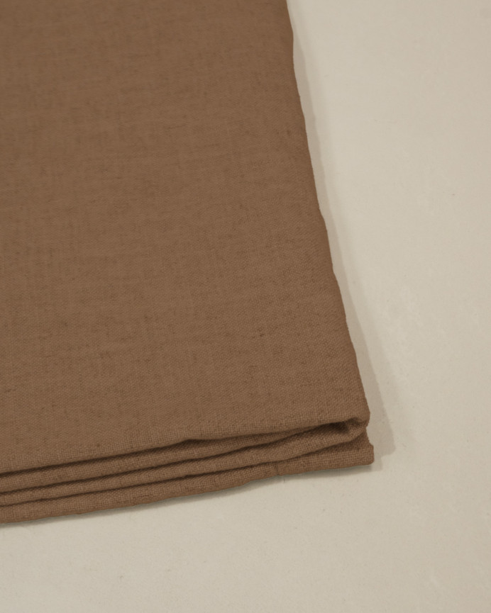 Linen headboard cover in terracotta available in various sizes.
