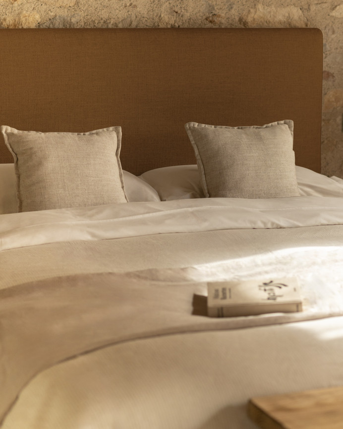 Linen headboard cover in terracotta available in various sizes.