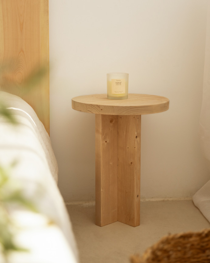 Solid wood bedside table in a medium oak tone measuring 45x35cm