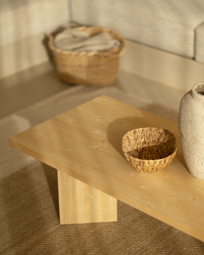Solid wood coffee table in a medium oak tone measuring 120x55cm.