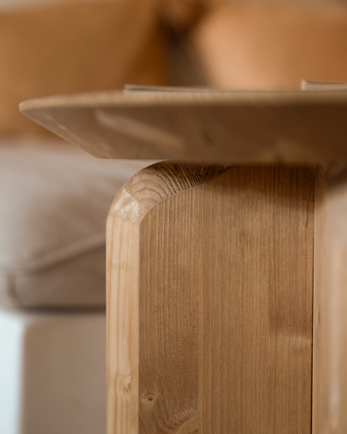 Solid wood side table in a medium oak tone measuring 50x45cm.