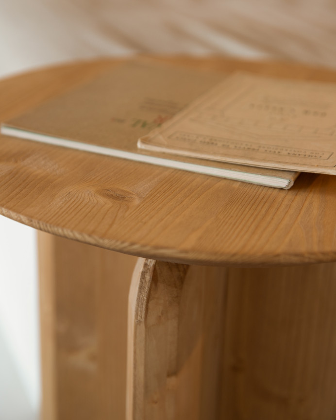 Solid wood side table in a medium oak tone measuring 50x45cm.