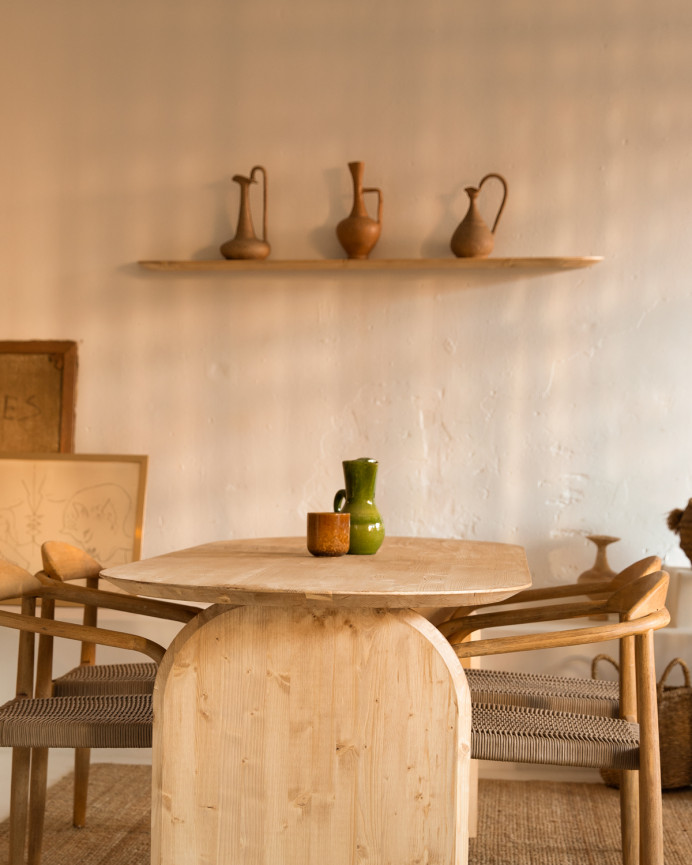 Rounded solid wood floating shelf in medium oak tone, various sizes.