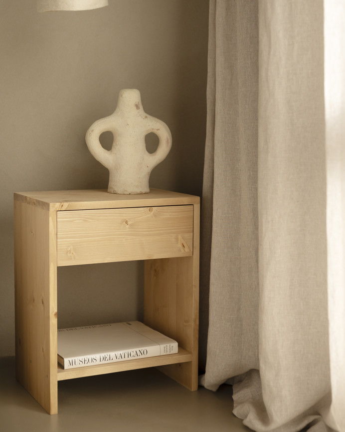 Set of 2 solid wood side tables with a drawer in a medium oak tone in various sizes.