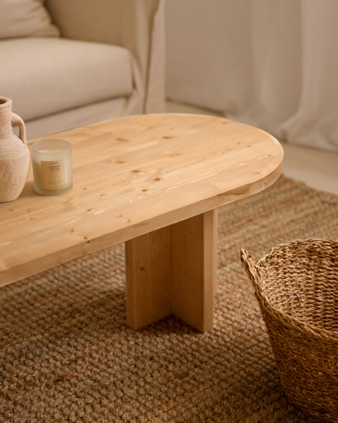 Solid wood coffee table in medium oak tone measuring 120x50cm.