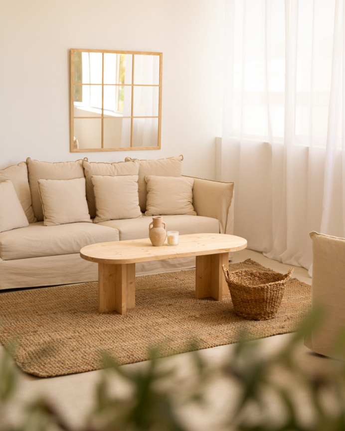 Solid wood coffee table in medium oak tone measuring 120x50cm.