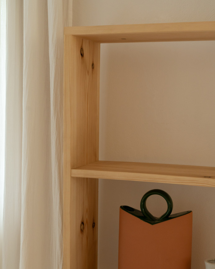 Solid wood shelving unit in medium oak tone with 3 shelves