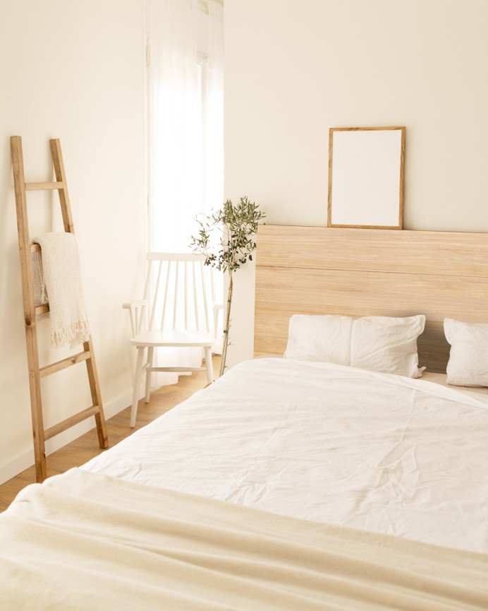 Solid wood headboard in medium oak tone of various sizes.