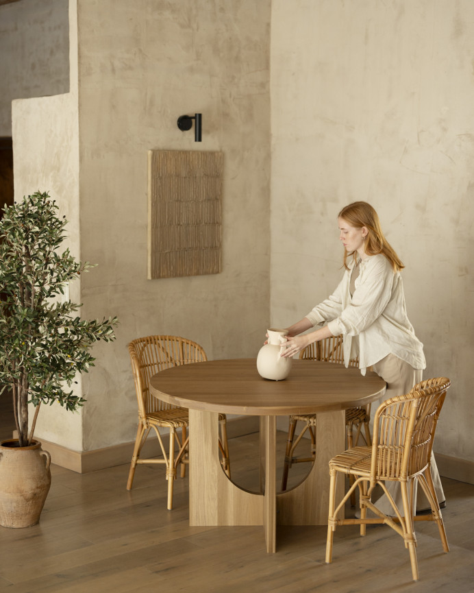 Round dining table made of solid poplar wood in various sizes.